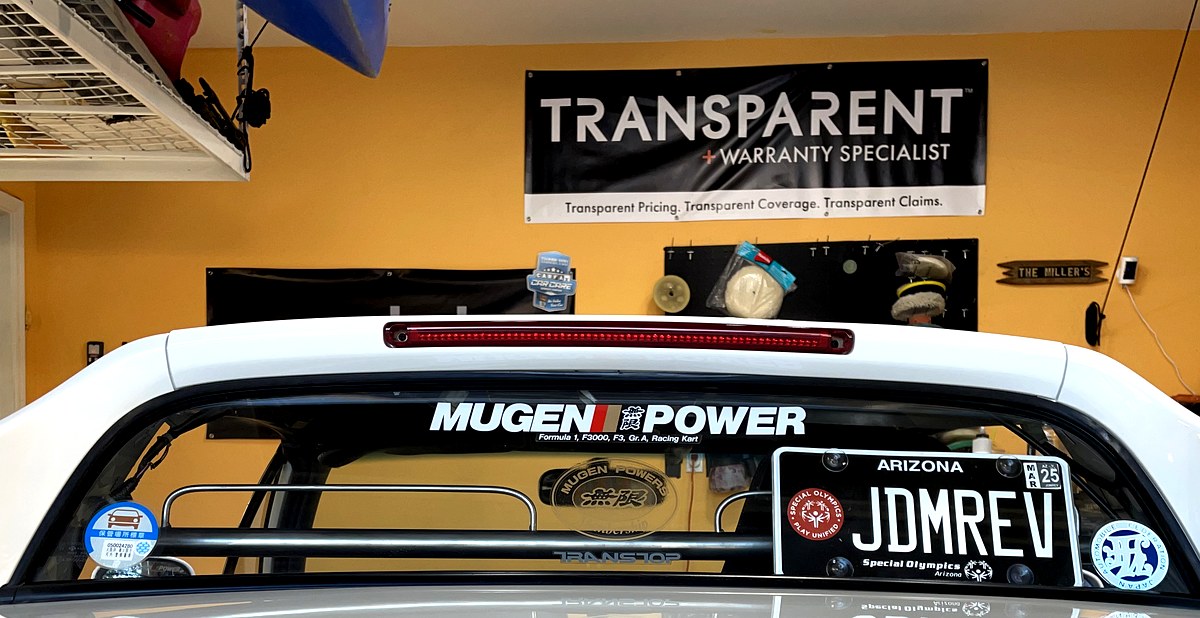 Transparent Warranty Specialist sign in Carvocity garage — Glassparency partner